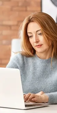 Person attending an online sober coaching session via video call